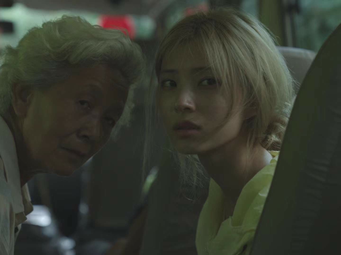 Two women looking back