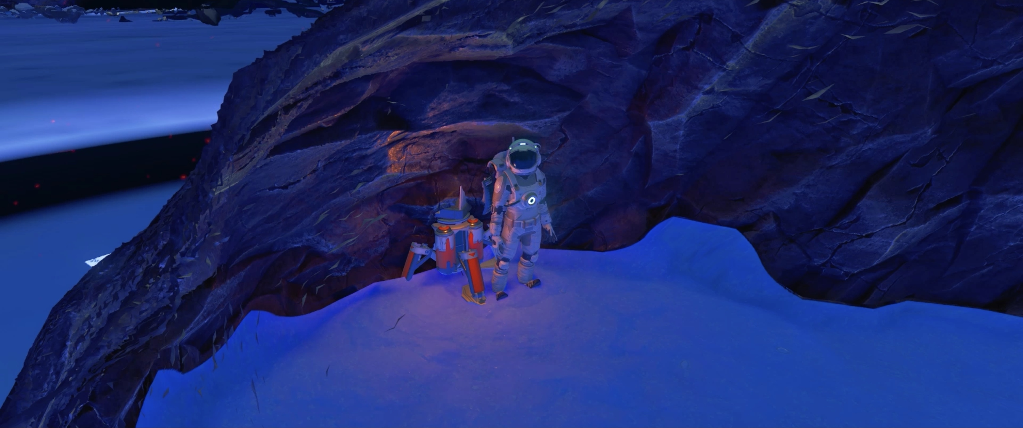 An astronaut beside a blue and purple rock face