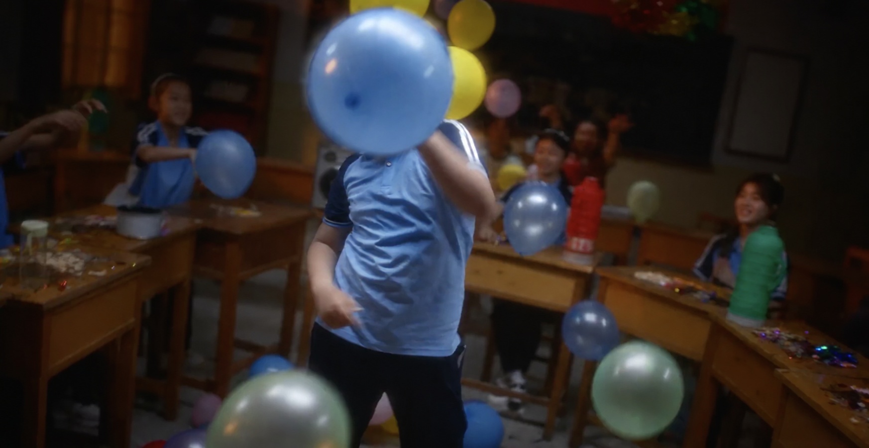 JD — a classroom celebration with colourful balloons
