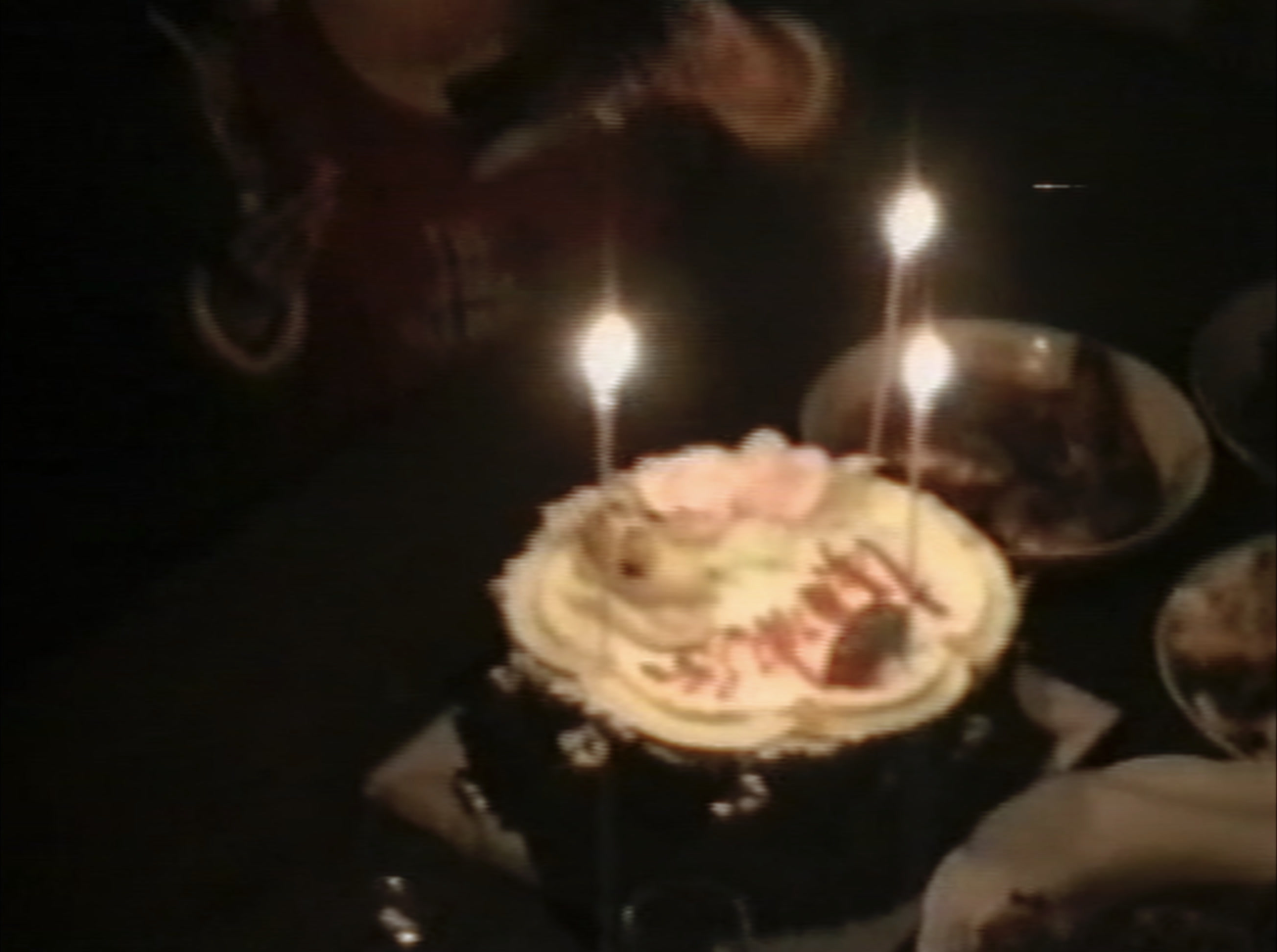 Candles burning on a birthday cake