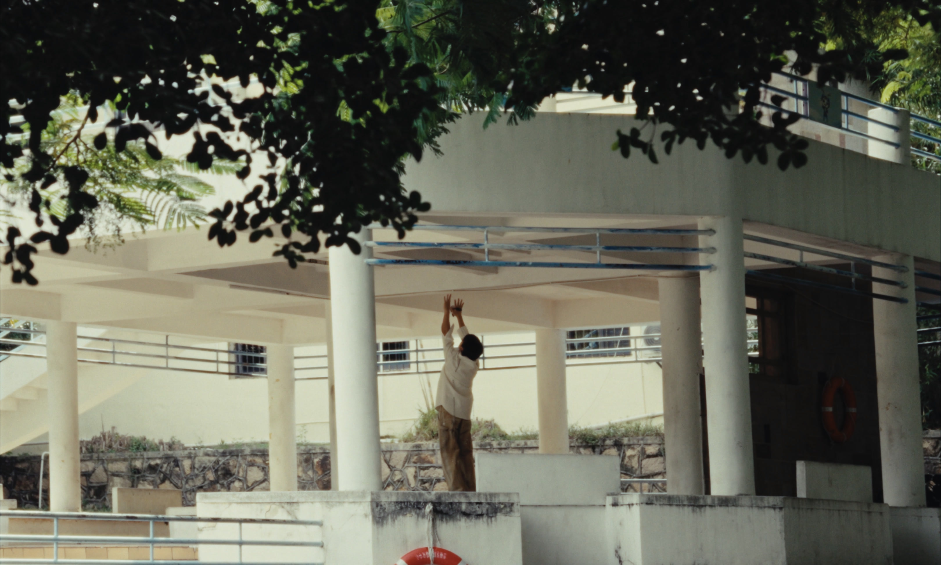 LING XIANG LI — Sean Tang beneath a pavilion