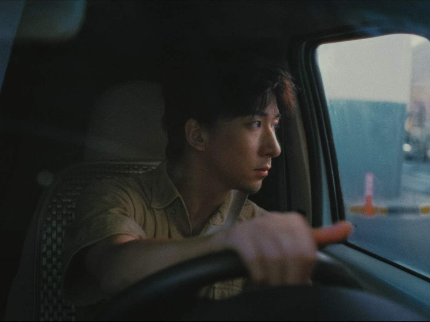 A driver looking through the car window